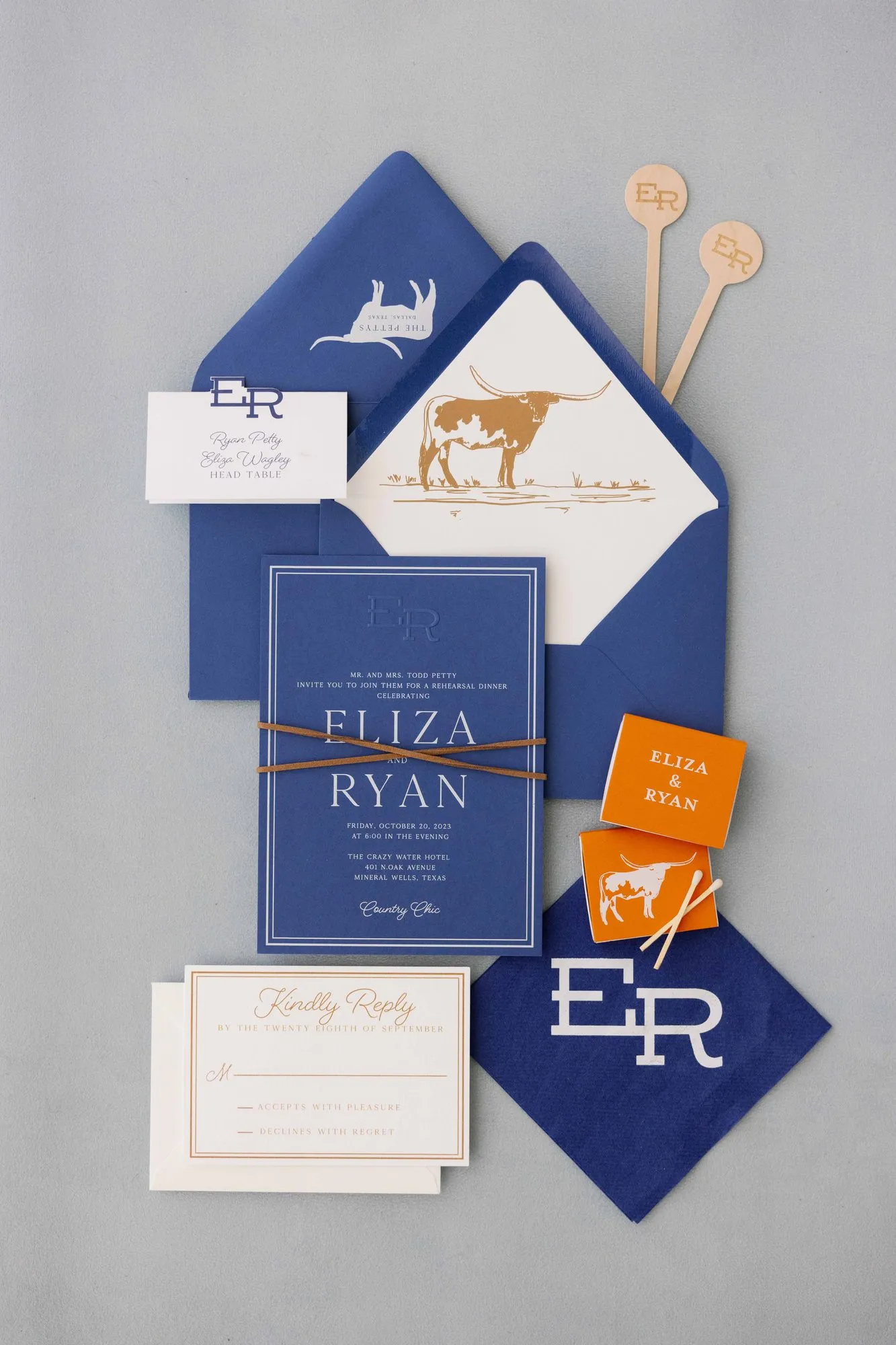 Eliza rehearsal dinner suite: royal blue invitation with longhorn liner, Mineral Wells, TX