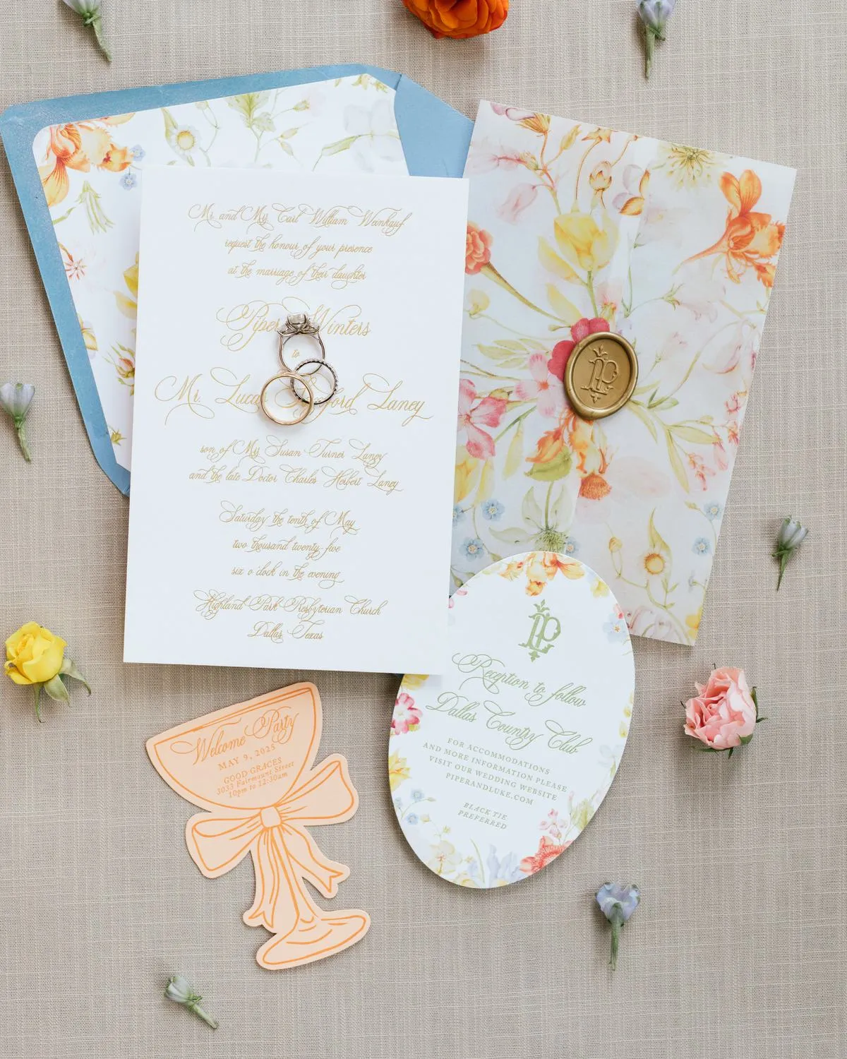 Laney suite: dusty blue envelope, floral liner, wax seal, and die-cut welcome, Dallas, TX